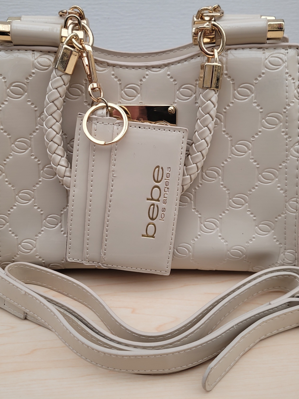 Bebe Cream Embossed Satchel Crossbody Bag – Gold Hardware
Elegant Bebe handbag - Picture 3 of 13